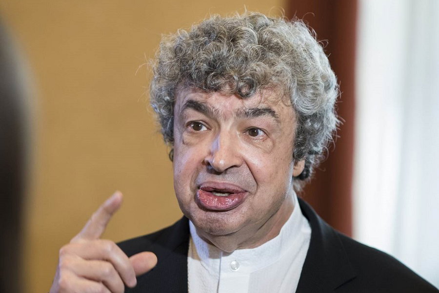 Semyon Bychkov talks to media after the signing