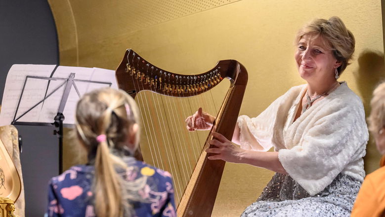Photo illustrating the event The Playful Harp